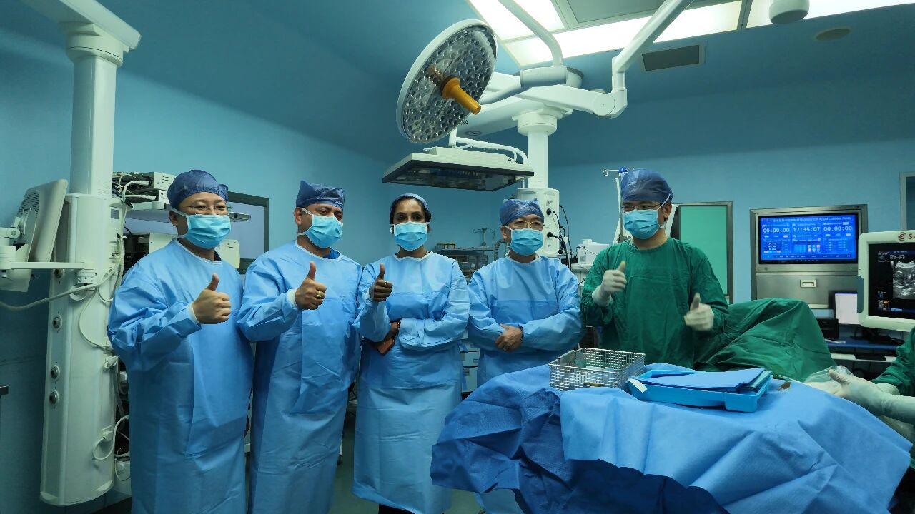 International clinical exchange team in a procedure room